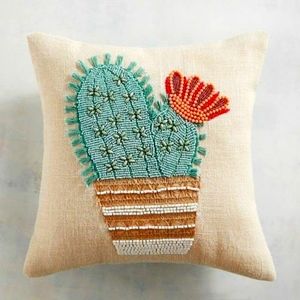 Hand embroidery beaded cushion for interior decoration with cotton fabric.